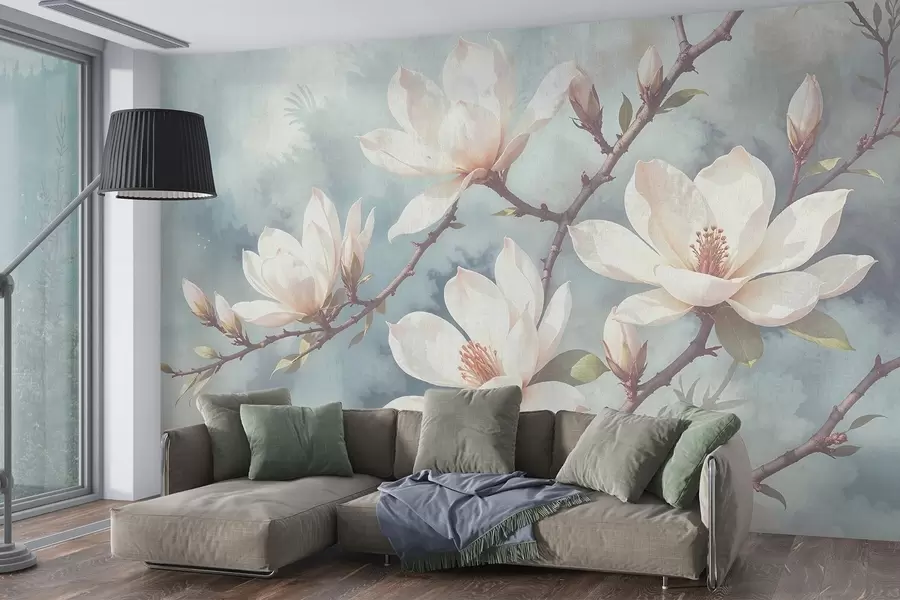 fototapet Flori albe de magnolie care înfloresc pe ramurile copacilor pe un fundal albastru cu textură blândă, neclară w08383